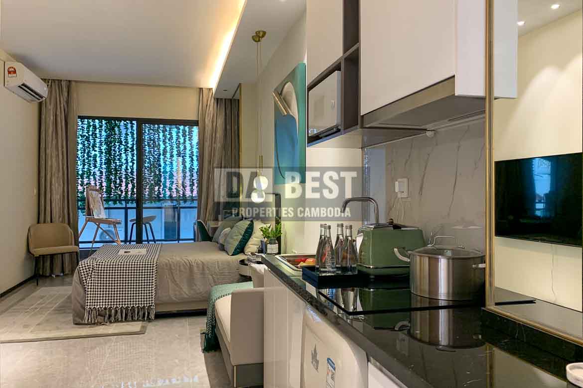 Studio Type Condo for Sale in BKK1, Phnom Penh — Contemporary kitchen design with dining table and built-in appliances.